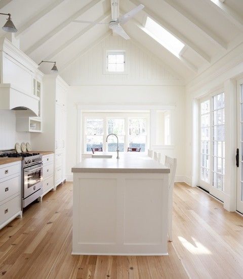 Traditional white kitchen - with lot of windows and natural light