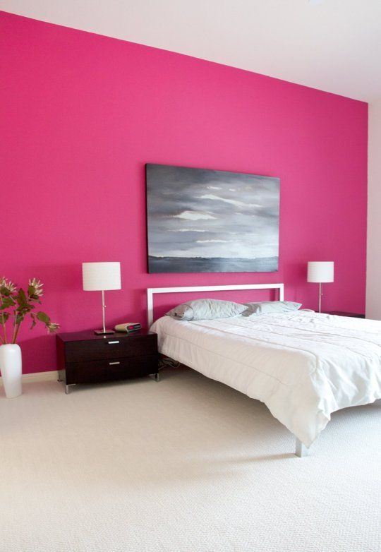 Vivid pink bedroom - with landscape picture above the bed