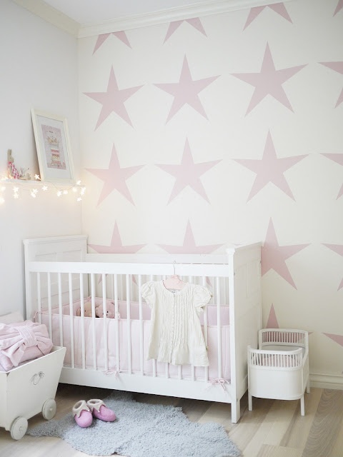 White and pink paint - with star decorations on the wall