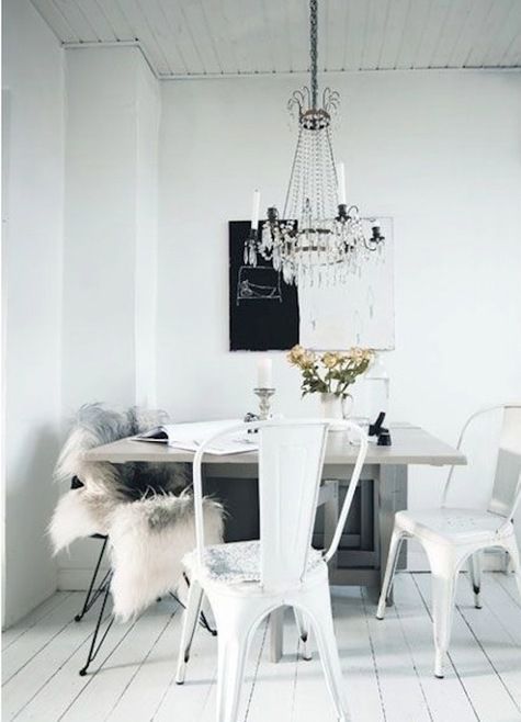 White eclectic dining room - with classic chandelier and modern furniture