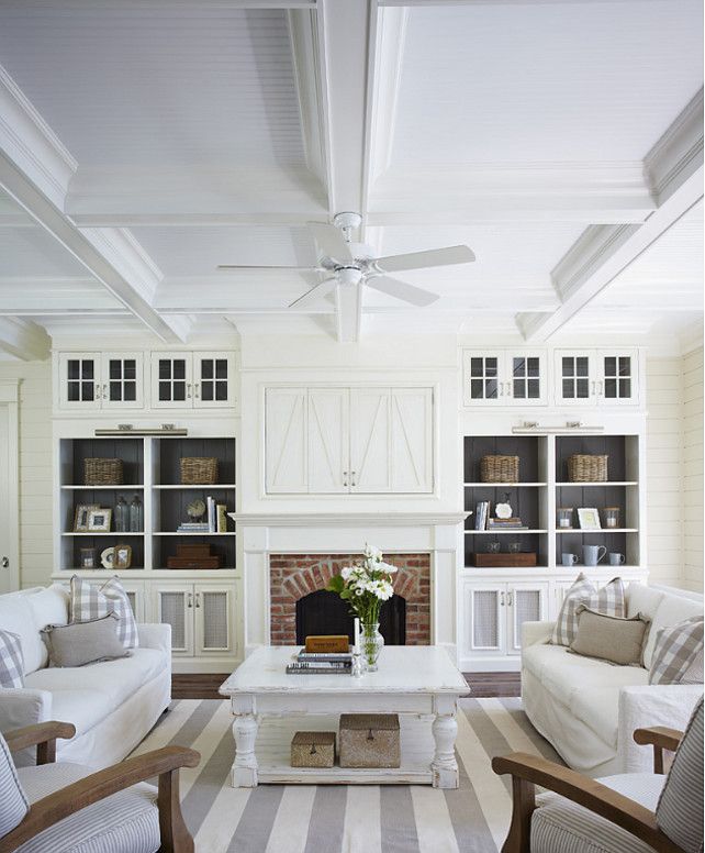 White traditional living room - with striped carpet on the floor