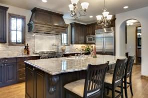 Kitchen island with granite surface on the top