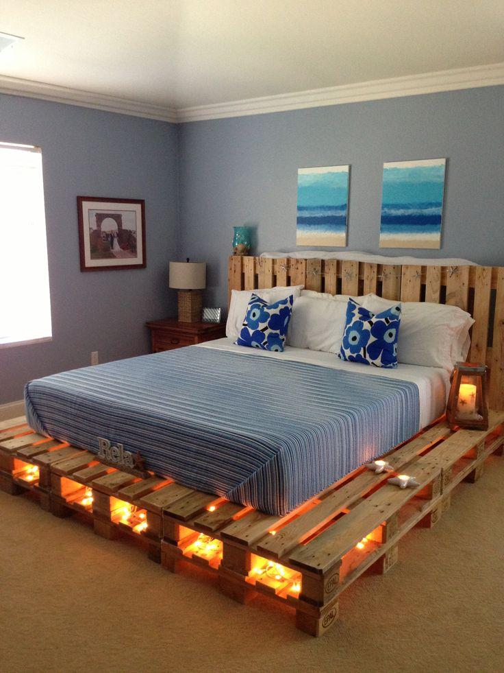 Romantic pallet bed - with candles betweent the holes