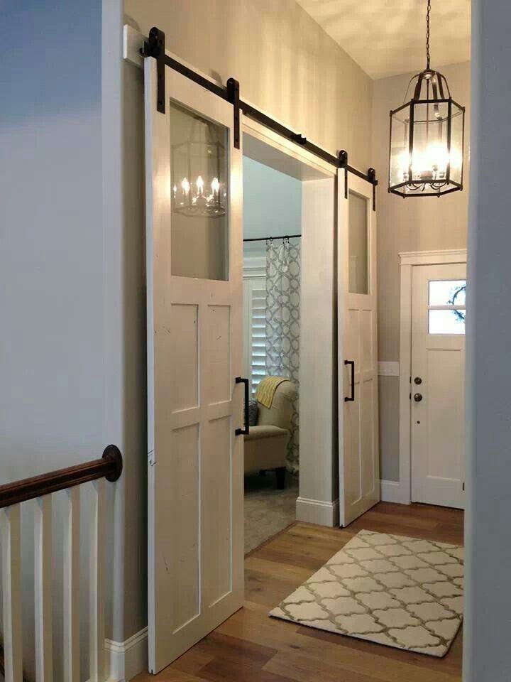 Simple sliding hallway door - inside a traditional home