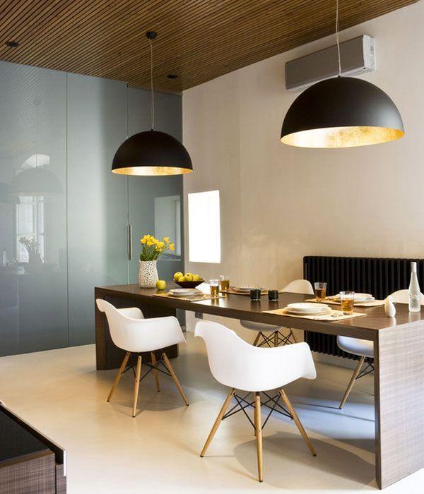 Stylish black modern pendants - placed in the dining room