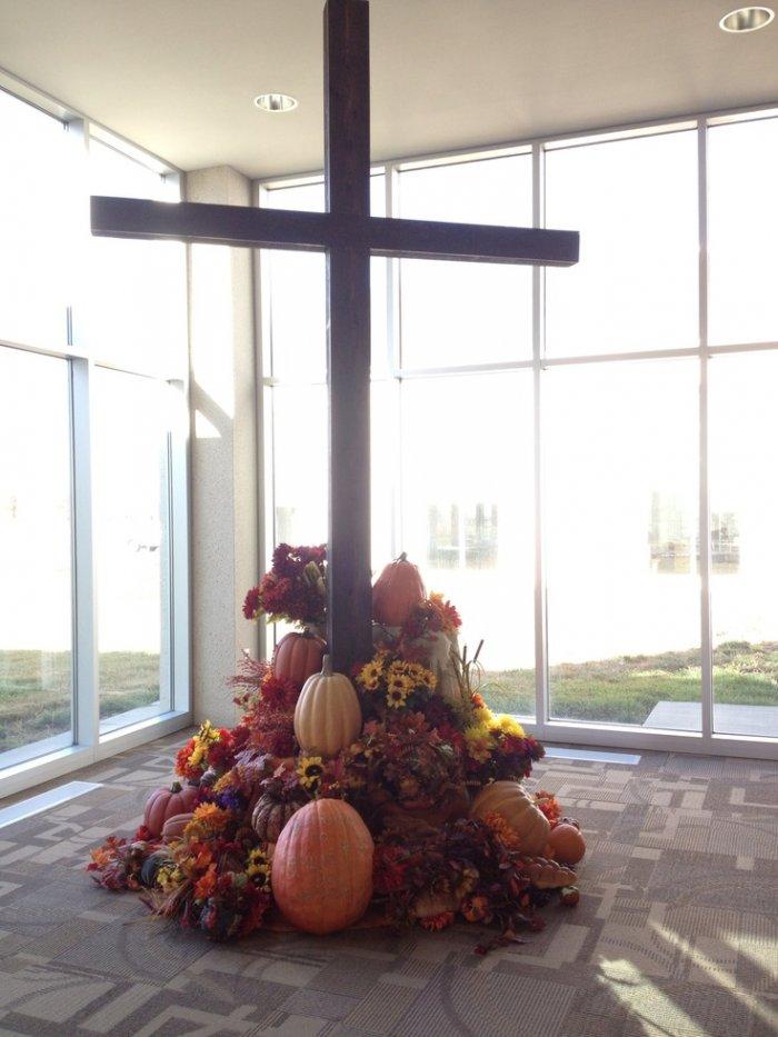 Thanksgiving decoration for church 4 - cross with flowers in a room