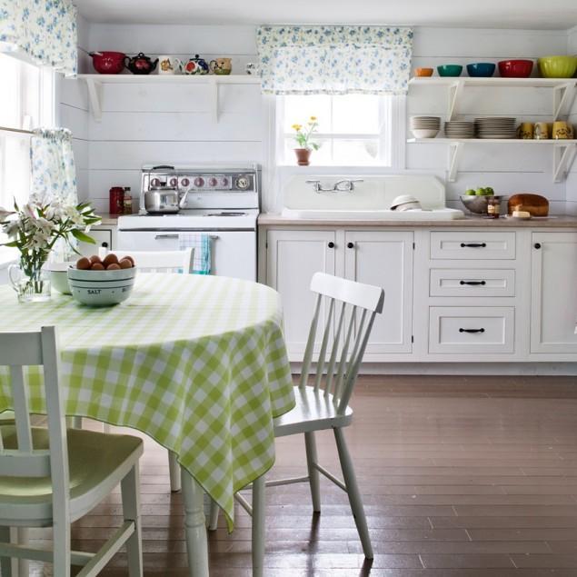 Kitchen with interesting yellow table cloth