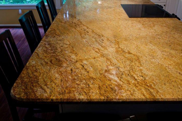 Yellow granite countertop - on a large kitchen island