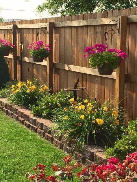 Line Your Fence – Hanging Pots from the Fence